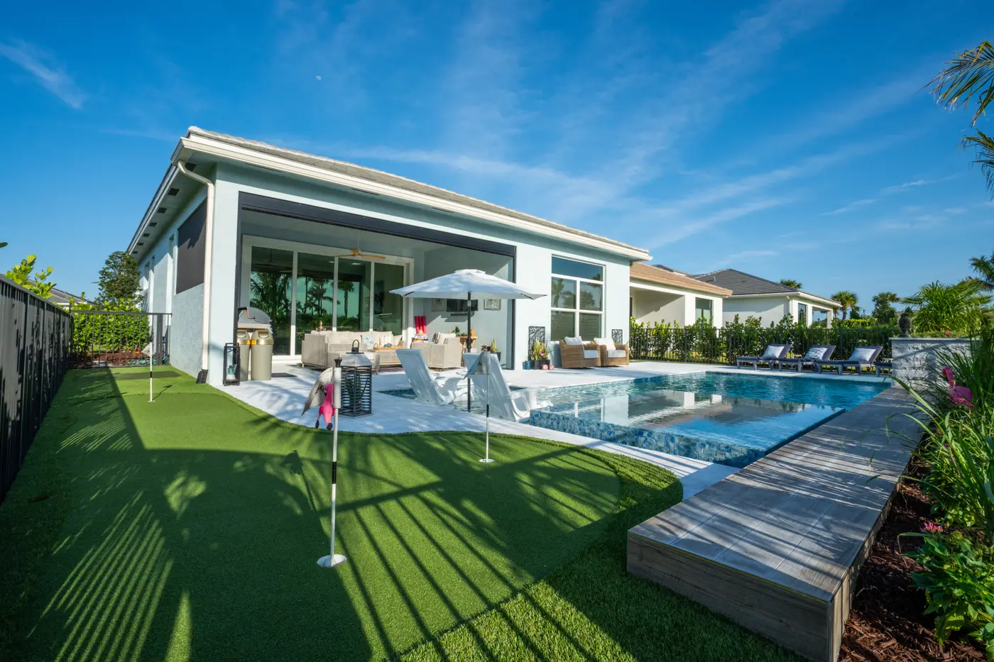 Freeform lagoon pool with rock work