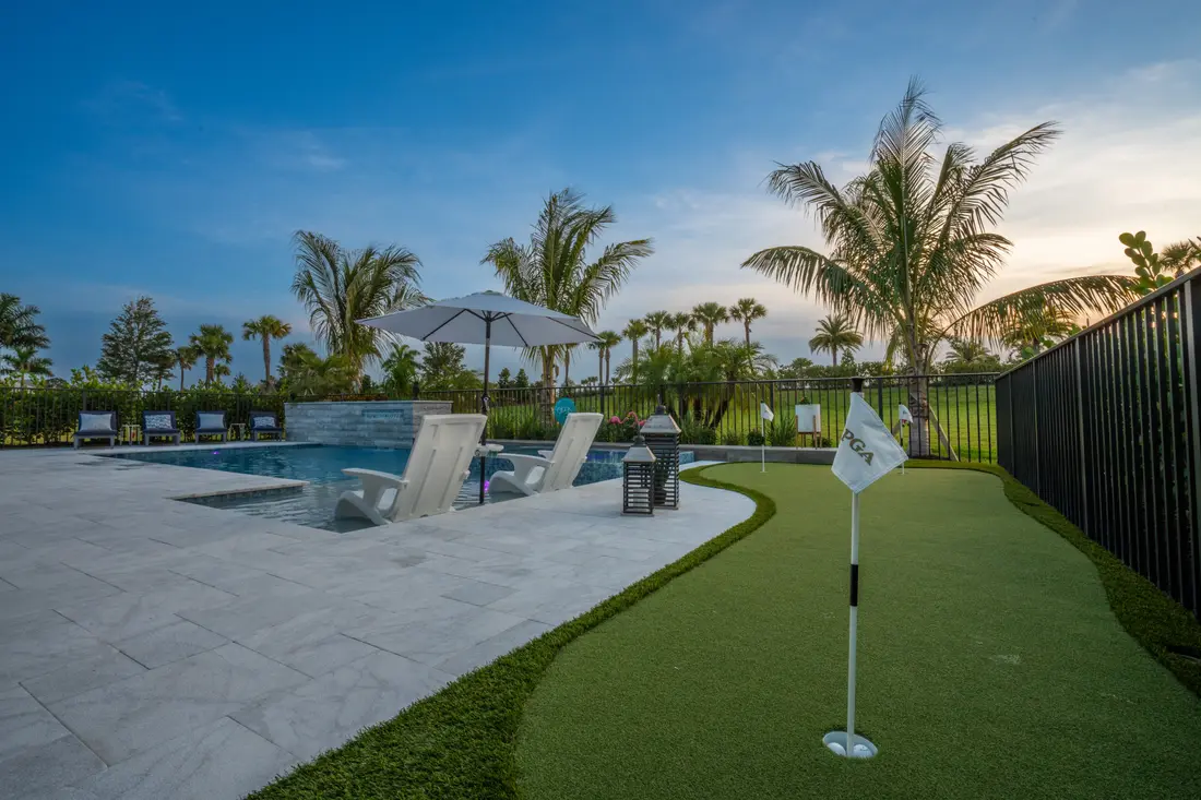 Screened pool with dark tile finish