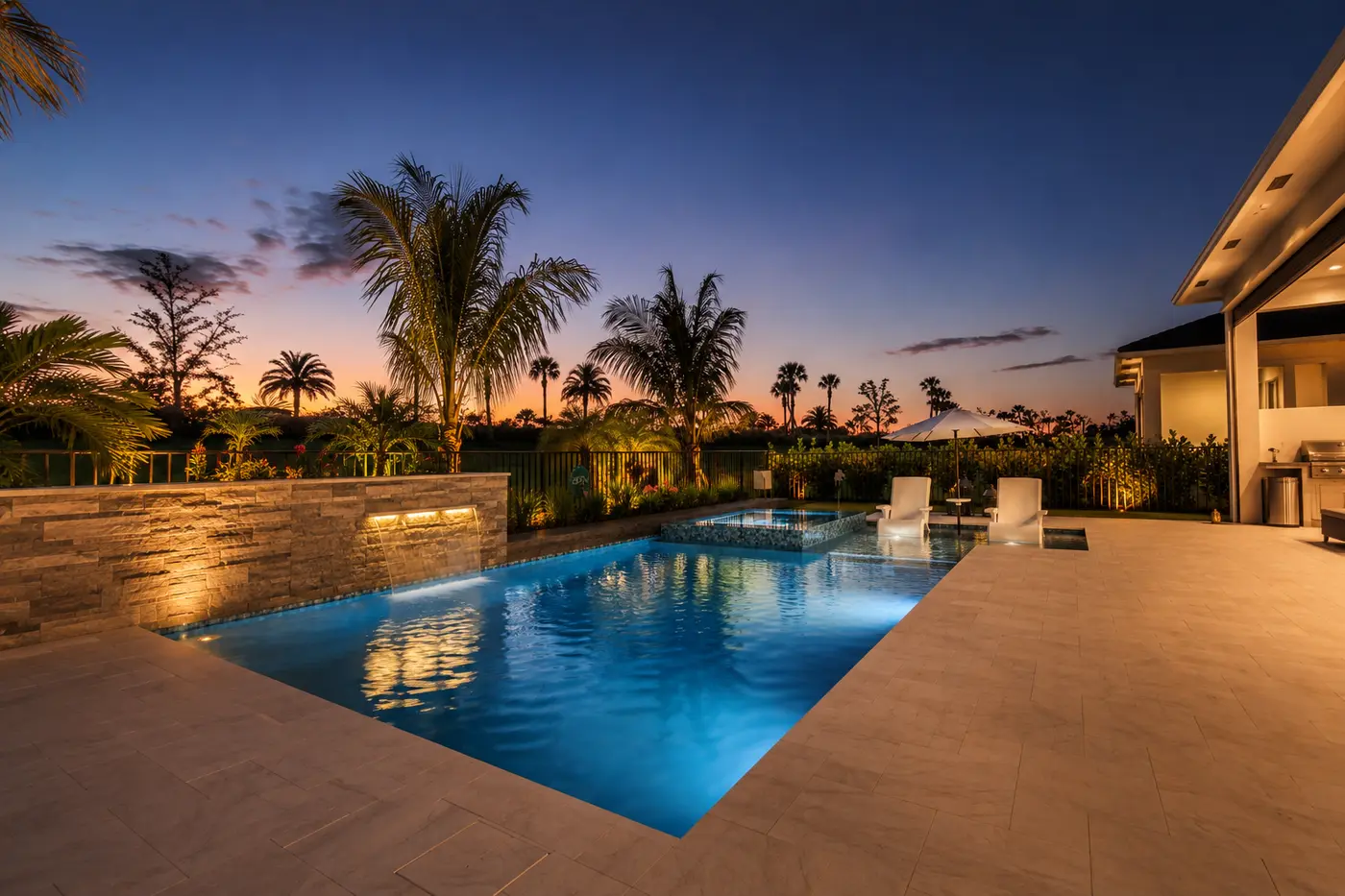 Pool with raised spa and glass tile in Sewall's Point